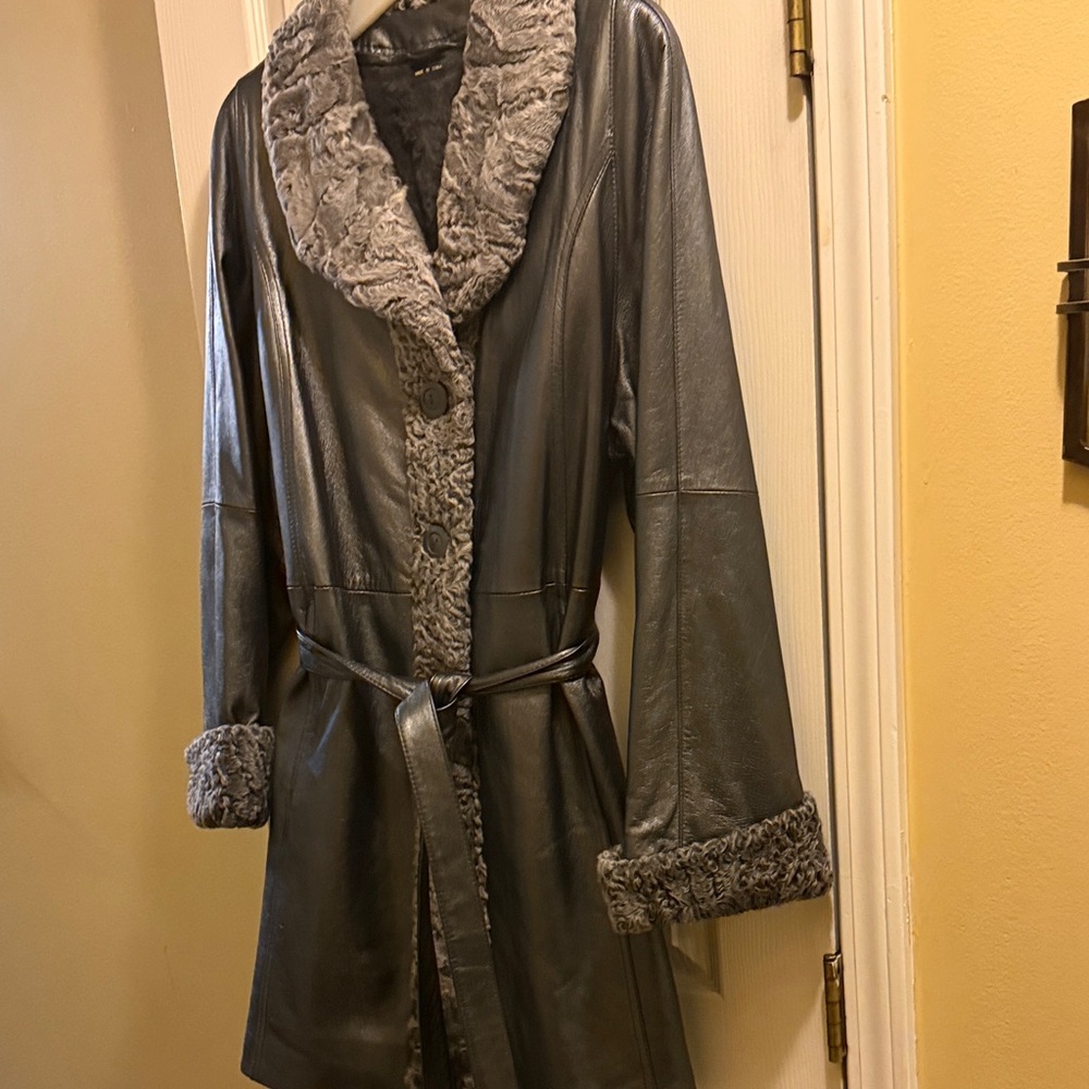Women’s grey/silver Lamb and Fox fur leather coat in a size medium.